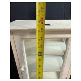 Small White Wall Cabinet and Framed Art Print