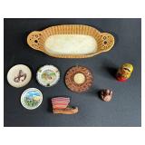 Collection of Vintage Souvenir Plates, Wicker Basket, Russian Nesting Doll, and Decorative Items