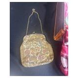 Vintage Suitcase with Assorted Silk Scarves and Tapestry Purse