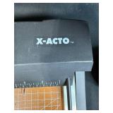 X-Acto Paper Cutter, Clip-On LED Lamp, and Desk Magnifier Lot