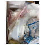 Box of Plastic Storage Bags and Round Paper Tags with Strings