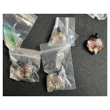 Collection of Glass Art Pendants with Floral and Heart Designs