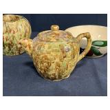 Collection of Vintage Stoneware Creamers, Teapot, and Advertising Bowls