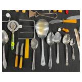 Collection of Vintage Bakelite Kitchen Utensils and Flatware