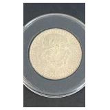 14 grams of silver 50% 1947 Un Peso