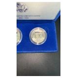 1986 90% Silver Dollar and clad half dollar commemorative set