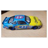 Racing Champions Mint Die Cast Collectibles including 1937 Ford Convertible, Cheerios #43 Pontiac, and Target #41 Dodge