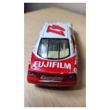 Racing Champions Mint Die Cast Collectibles including 1937 Ford Convertible, Cheerios #43 Pontiac, and Target #41 Dodge