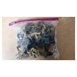Military toy soldier figures in bags