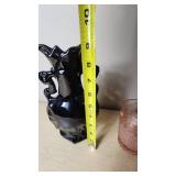 Black Ceramic Vase and Pink Glass Tumbler