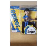 McFarlane Toys The Beatles George Harrison Figure and Padron Wooden Cigar Box
