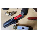 Lot of Knives and Tools Including Buck Knife, Victorinox Swiss Army Knife, and Vintage Fixed Blade