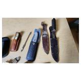 Lot of Knives and Tools Including Buck Knife, Victorinox Swiss Army Knife, and Vintage Fixed Blade