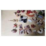 Lot of Holiday Decorations and Ornaments including Wooden Figures, Snowmen, and Santa Figures