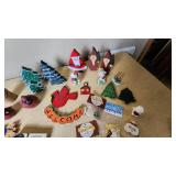 Lot of Holiday Decorations and Ornaments including Wooden Figures, Snowmen, and Santa Figures