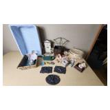 Lot of Home and Garden Decor Items including Metal Plaques, Baskets, and Figurines