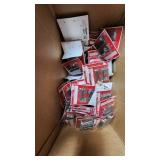 Christmas and Holiday Decor Lot including Gift Bags, Ornaments, and Wrapping Accessories