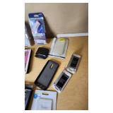 Samsung and Sony Electronics Lot including Galaxy Note5 S-View Flip Cover, Mophie Juice Pack, and Sony Earbuds