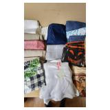 Assorted Tablecloths and Fabric Items