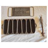 Antique Cast Iron Kitchenware Set including Corn Cob Pan, Spring Handle, and All-In-One Grater