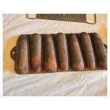 Antique Cast Iron Kitchenware Set including Corn Cob Pan, Spring Handle, and All-In-One Grater