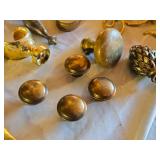 Assorted Brass and Metal Decorative Items Including Plates, Shoe Figurine, Napkin Rings and Knobs