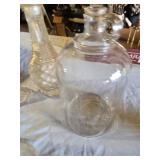 Glassware Collection including Cut Glass Decanter, Large Jug, and Candlestick Holders