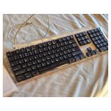 USB-C to Digital AV Multiport Adapter, Wired Keyboard, and Purple Bluetooth Keyboard