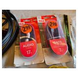 Various audio, video, and network cables, including RCA stereo audio cables, CAT6 network cables, VGA extension cables, USB printer cables, and more.