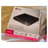 LG Slim Portable DVD Writer GP50, T-Mobile LineLink, and Timex Sinclair 16K RAM Module