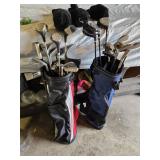 Spalding and Dunlop Golf Club Bags with Various Clubs