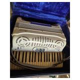 Vintage Venucci Accordion with Case and Sheet Music - Appears in Good Condition
