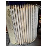 Vintage Venucci Accordion with Case and Sheet Music - Appears in Good Condition
