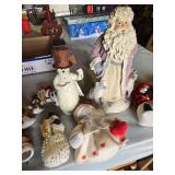 Lot of Christmas Decorations including Snowman Figurines, Santa Figure, and Various Ornaments