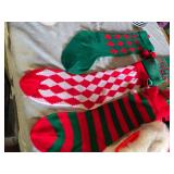 Christmas hats and stockings including festive designs and patterns