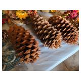 Lot of Decorative Fall and Holiday Items including Large Pine Cones, Baskets, and Floral Arrangements