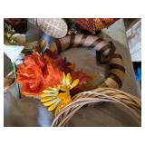 Lot of Decorative Fall and Holiday Items including Large Pine Cones, Baskets, and Floral Arrangements