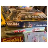Board games and puzzles including Wits & Wagers, Risk, and Snorta