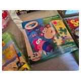 Board games and puzzles including Wits & Wagers, Risk, and Snorta