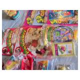 Assorted Vintage Toy Collection Including McGruff Comic Books, Grinch Plush, and Snoopy Toy Set