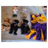 Minnesota Twins Bobblehead, Minnesota Vikings Mug, Goodwrench Service Plus NASCAR Bears, and Vikings Cheerleading Outfit