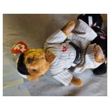 Minnesota Twins Bobblehead, Minnesota Vikings Mug, Goodwrench Service Plus NASCAR Bears, and Vikings Cheerleading Outfit