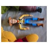 Lot of Toys and Action Figures Including Disney Characters and Plush Toys