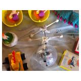 Assorted Vintage Toy Collection Including Flintstones, Dinosaurs, and Puzzle Games