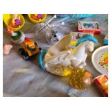 Assorted Vintage Toy Collection Including Flintstones, Dinosaurs, and Puzzle Games