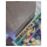 Assorted Vintage Toy Collection Including Flintstones, Dinosaurs, and Puzzle Games