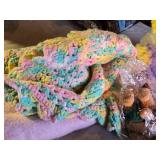 Pastel Plush Bunny, Crocheted Blanket, and Assorted Stuffed Toys