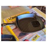 Lodge Cast Iron Grill Pan Set with Red Silicone Handle Holder and Other Cast Iron Grill Pan