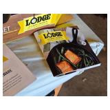 Lodge Cast Iron Grill Pan Set with Red Silicone Handle Holder and Other Cast Iron Grill Pan