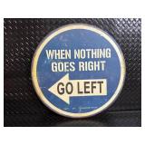 Vintage Round Metal Sign - When Nothing Goes Right Go Left - 22 in. Diameter